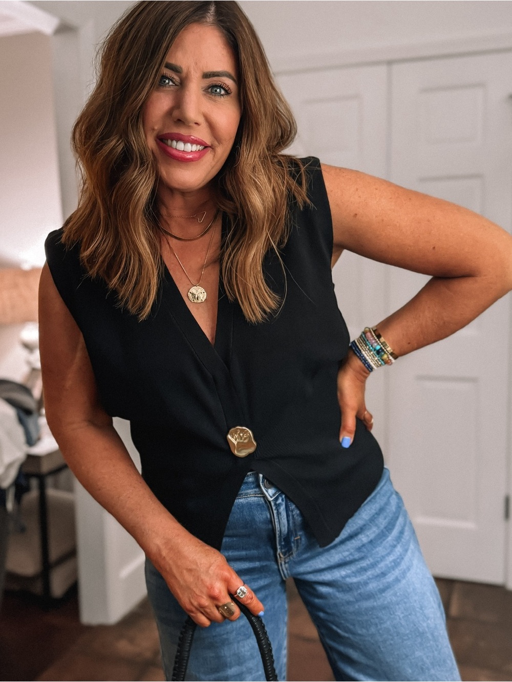 Amazon Black Sleeveless V-Neck Button Front Blouse